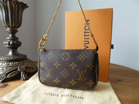 mini pochette accessoire louis vuitton|louis vuitton mini monogram.